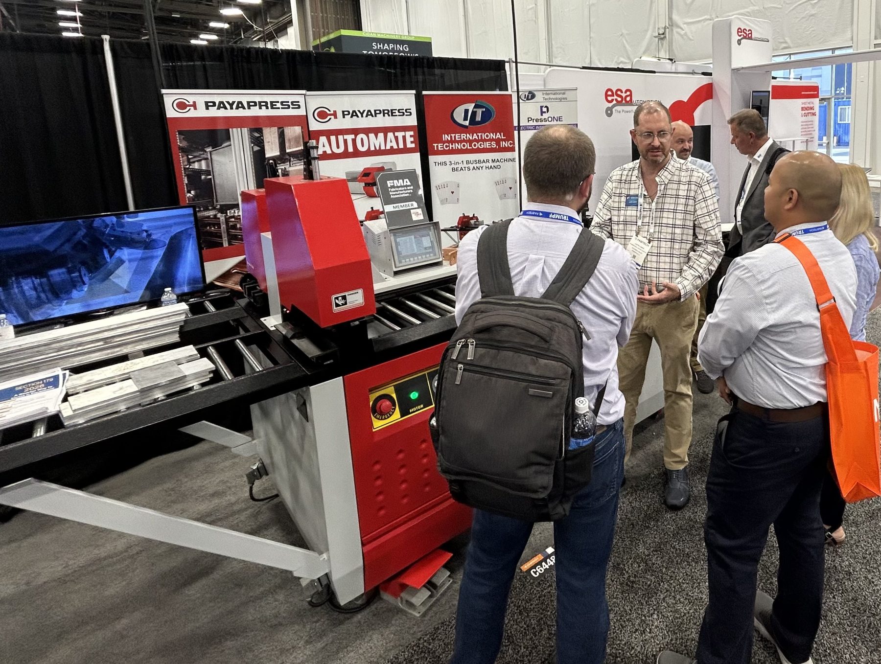 International Technologies Fabtech Booth with Payapress Busbar Processing Macnine and customers